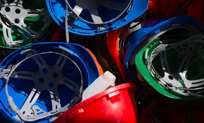 Different coloured hard hats